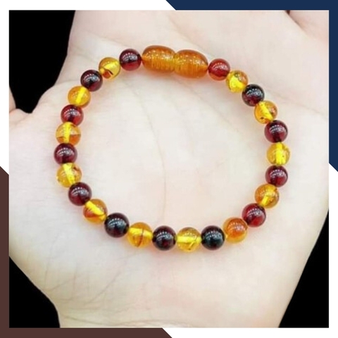 Set vòng cổ, vòng tay hổ phách cho bé mã AC260