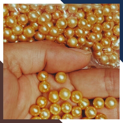 Viên ngọc trai thật màu vàng nuôi nước ngọt tự nhiên 7mm - 8mm tròn xoe, độ bóng 5A không vết sinh trưởng.