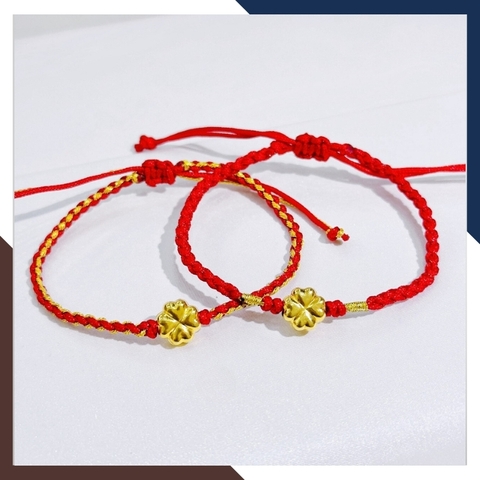 Vòng tay chỉ đỏ charm cỏ 4 lá vàng tây 10k mã AC310