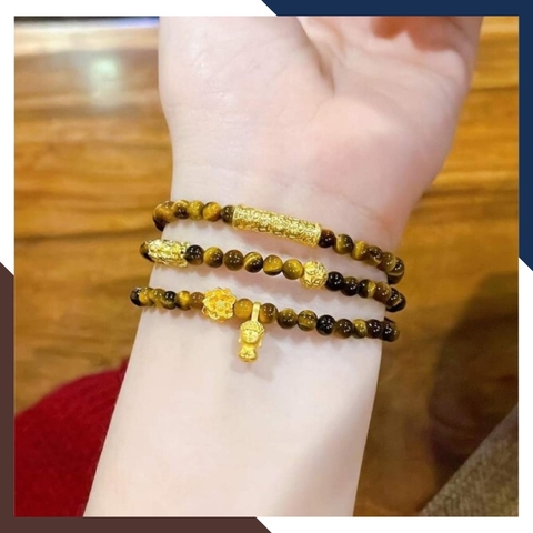 Vòng tay đá mắt hổ vàng nâu mix charm vàng 24k mã AC1890