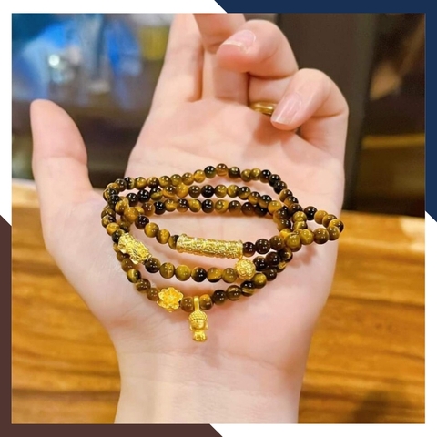 Vòng tay đá mắt hổ vàng nâu mix charm vàng 24k mã AC1890