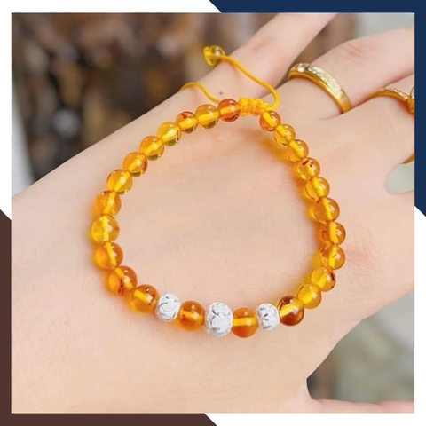 Vòng tay hổ phách mix bi bạc cho bé mã AC070