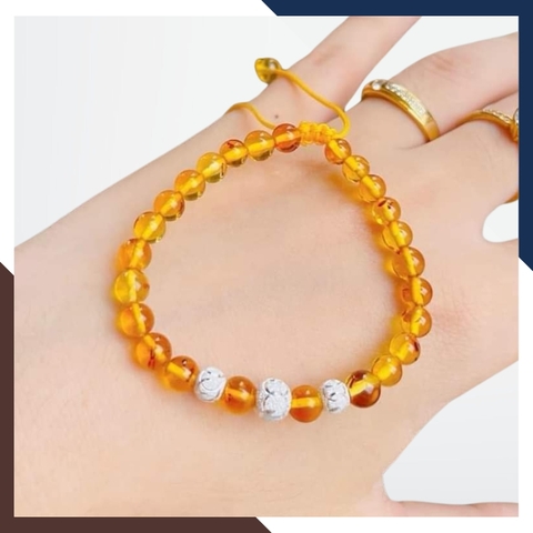 Vòng tay hổ phách mix bi bạc cho bé mã AC070