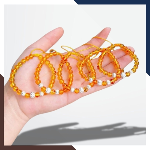 Vòng tay hổ phách mix bi bạc cho bé mã AC070