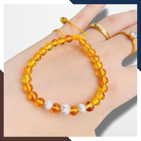 Vòng tay hổ phách mix bi bạc cho bé mã AC070