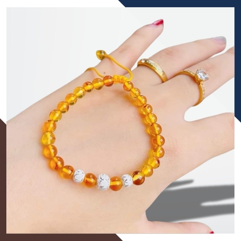 Vòng tay hổ phách mix bi bạc cho bé mã AC070