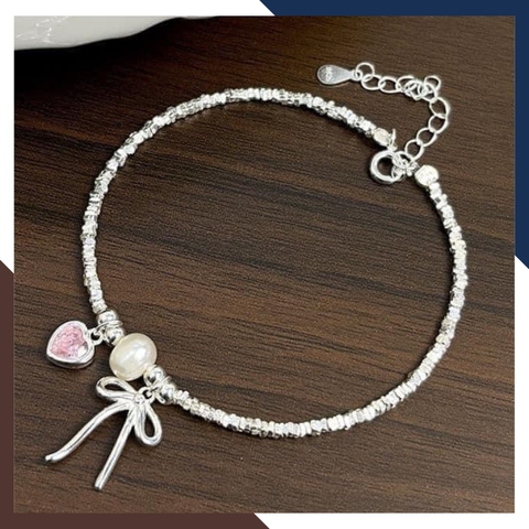 Vòng Tay Ngọc Trai Phối Bạc Vụn Mix Nơ & Trái Tim Hồng VTNT28