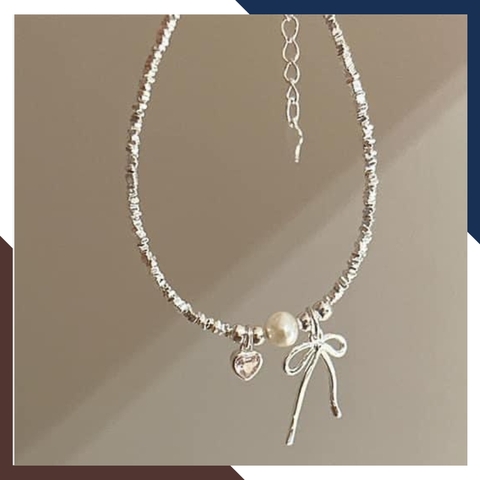 Vòng Tay Ngọc Trai Phối Bạc Vụn Mix Nơ & Trái Tim Hồng VTNT28