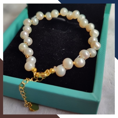 Vòng tay ngọc trai thật , lắc tay ngọc trai hạt so le phối bi bạc mã 120AC665