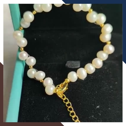 Vòng tay ngọc trai thật , lắc tay ngọc trai hạt so le phối bi bạc mã 120AC665