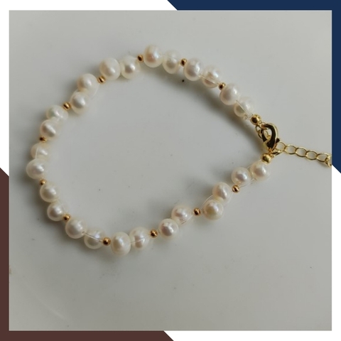 Vòng tay ngọc trai thật , lắc tay ngọc trai hạt so le phối bi bạc mã 120AC665