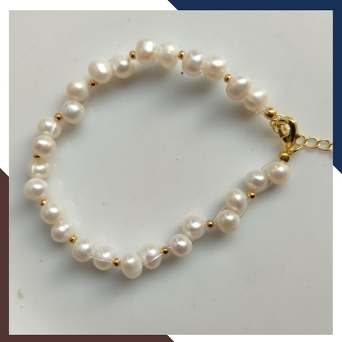 Vòng tay ngọc trai thật , lắc tay ngọc trai hạt so le phối bi bạc mã 120AC665