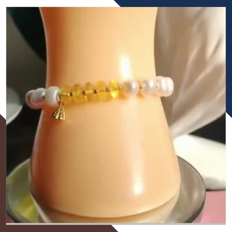 Vòng tay ngọc trai thật , lắc tay ngọc trai tự nhiên phối đồng điếu hổ phách mã 78AC165