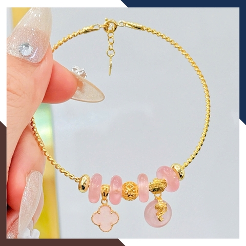 Vòng tay vàng xoắn 10k phối đồng điếu & charm cỏ 4 lá đá mắt mèo tự nhiên LTVN218