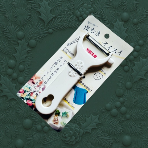 TB. Dụng cụ nạo sợi màu trắng Nhật Bản 18,6x9,5cm