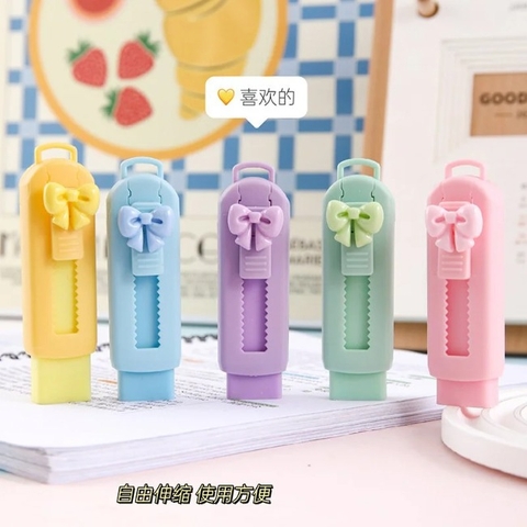 Bút tẩy có thể kéo đẩy gắn charm nơ