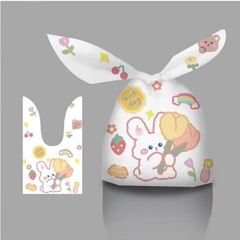 Túi đựng bánh kẹo tai thỏ có nhiều họa tiết dễ thương 14*23*3 - KING OF OPP