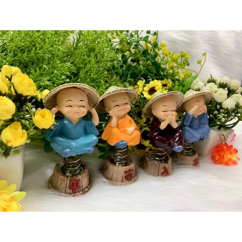 Bộ 4 tượng chú tiểu có đế lò xo