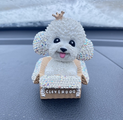 Chú chó đính đá thông minh lắc đầu ngồi hộp giấy Clever Dog