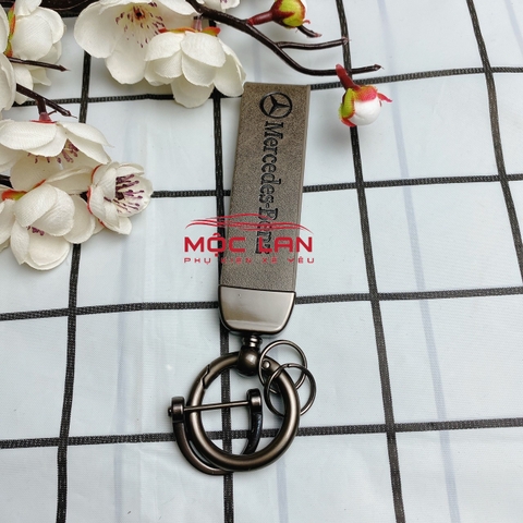 Móc khoá dây da T2 dài chất liệu da bò dập chìm logo