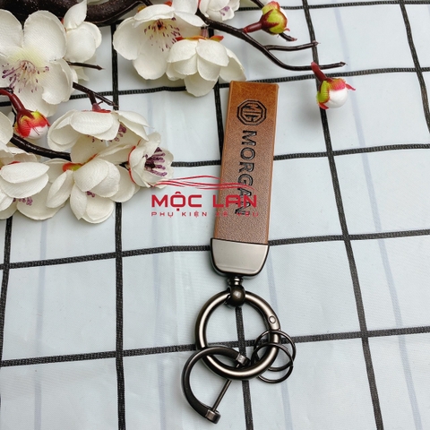 Móc khoá dây da T2 dài chất liệu da bò dập chìm logo