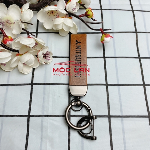 Móc khoá dây da T2 dài chất liệu da bò dập chìm logo
