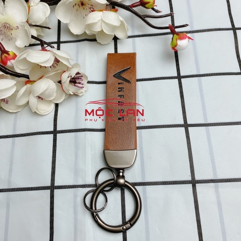 Móc khoá dây da T2 dài chất liệu da bò dập chìm logo