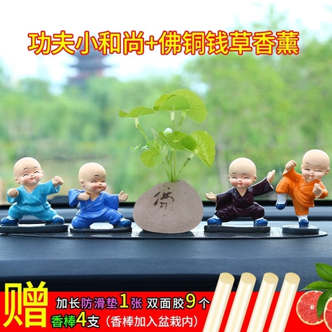 Bộ 4 tượng chú tiểu có đế lò xo