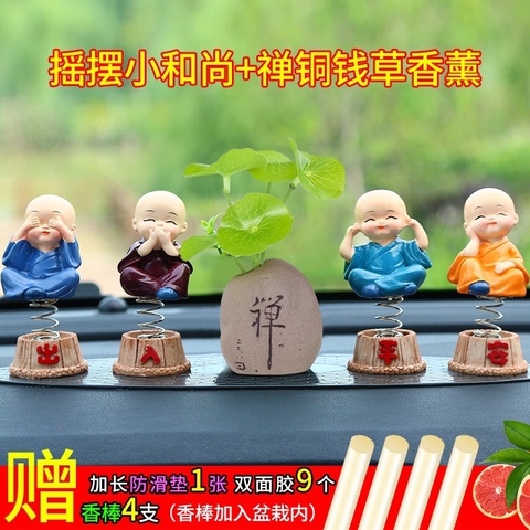 Bộ 4 tượng chú tiểu có đế lò xo