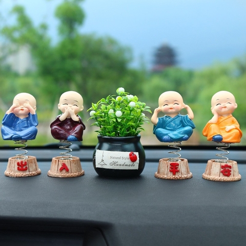 Bộ 4 tượng chú tiểu có đế lò xo