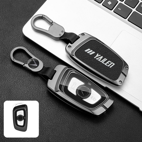 Bộ ốp kim loại lưng da lộn dập chìm logo + móc khoá VINFAST