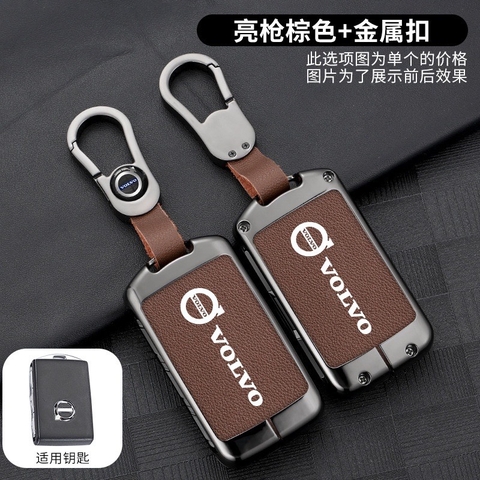 Bộ ốp kim loại lưng da + móc khoá dây da hãng Volvo