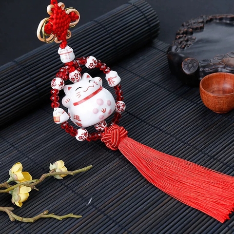 Khánh mèo sứ thần tài mix vòng hạt treo phong thủy