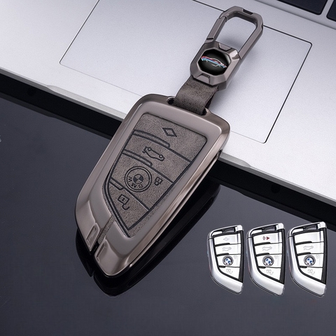 Bộ ốp kim loại mặt da + lưng da bò dập chìm logo mix móc khoá BMW