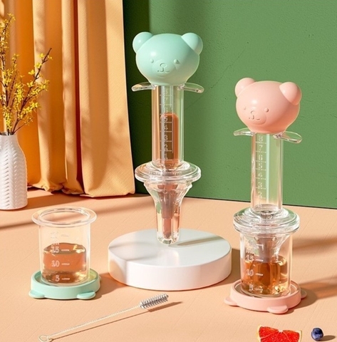 AK - DỤNG CỤ UỐNG THUỐC+SỮA HÌNH GẤU