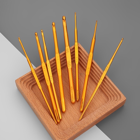 Kim móc 2 đầu vàng