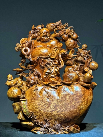 Tượng di lạc đứng bao tiền vàng gỗ nu ngọc am đẹp
