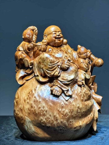 Tượng di lạc ngồi bao tiền vàng Gỗ Nu Ngọc Am thơm