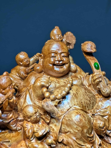 Tượng di lạc ngồi bao tiền vàng gỗ nu ngọc am đẹp