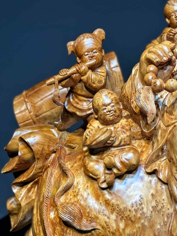 Tượng di lạc ngồi bao tiền vàng gỗ nu ngọc am đẹp