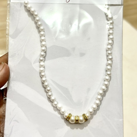 Dây chuyền ngọc trai phù hợp mặc áo dài dịp lễ Tết