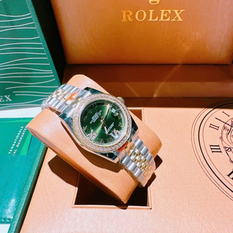 Rolex Mặt Số La Mã |Nữ Giới |Xanh Lá |Dây Kim Loại Demi Vàng Gold |Máy Pin (Máy Quartz) |Size 31mm