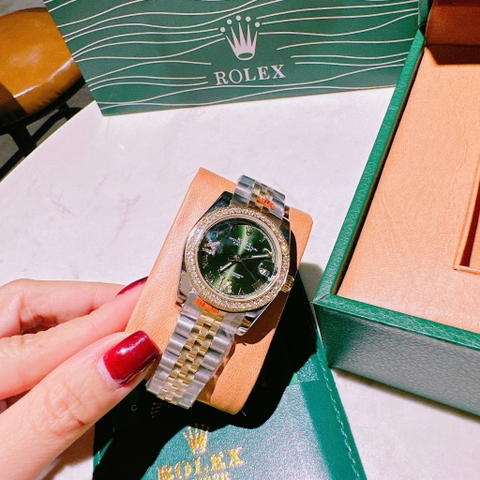 Rolex Mặt Số La Mã |Nữ Giới |Xanh Lá |Dây Kim Loại Demi Vàng Gold |Máy Pin (Máy Quartz) |Size 31mm