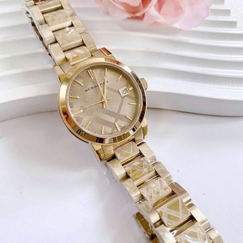 Burberry The City |Cặp Đôi |Mặt Tròn |Dây Kim Loại Vàng Gold |Size 38x34mm