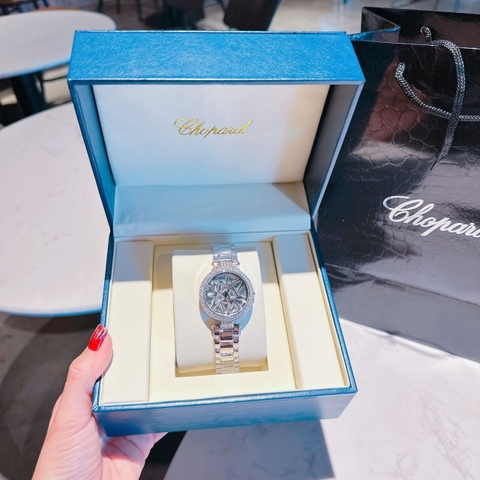 Chopard Mặt Xoay |Nữ Giới |Đính Pha Lê |Dây Kim Loại Trắng Silver |Máy Pin (Quartz) |Size 35mm
