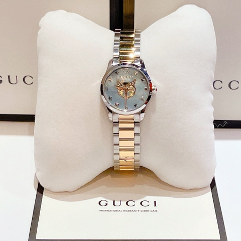 Gucci G-Timeless Mystic Cat Motif |Nữ |Mặt Xanh |Dây Kim Loại Demi Vàng |Máy Pin (Quartz) |Size 28mm