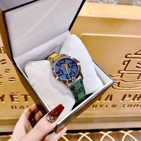 Gucci Multicolor G-Timeless |Nữ Giới |Mặt Xanh Dương |Dây Da 2 Màu |Máy Pin (Quartz) |Size 38mm