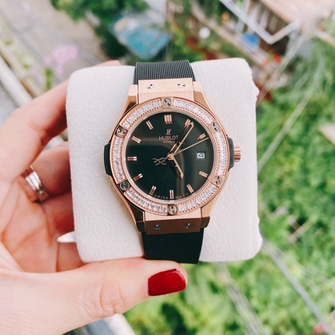 Hublot Geneve |Nữ Giới |Rose Gold |Đính Đá |Dây Silicone Đen |Máy Pin (Máy Quartz) |Size 34mm