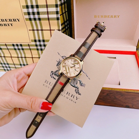 Burberry The Classic Round |Nữ Giới |Vàng Gold |Dây Vải Bọc Da Nâu |Máy Pin (Quartz) |Size 32mm