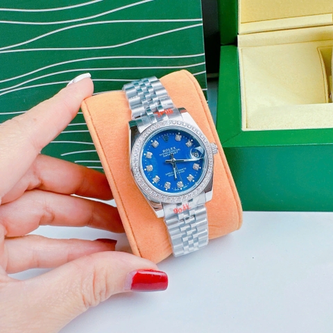 Rolex Đính Đá |Nữ Giới |Mặt Xanh Dương |Dây Kim Loại Silver |Máy Pin (Máy Quartz) |Size 31mm